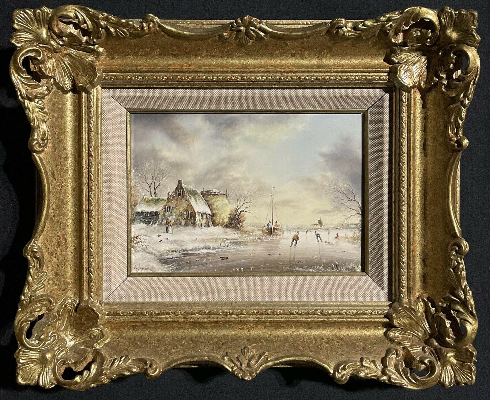 Paire de paysages d'hiver néerlandais représentant des patins à glace sur un lac et des peintures encadrées 1