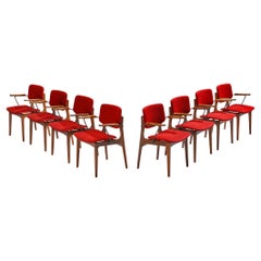 Conjunto holandés de ocho sillones de teca y tapicería rojo burdeos 
