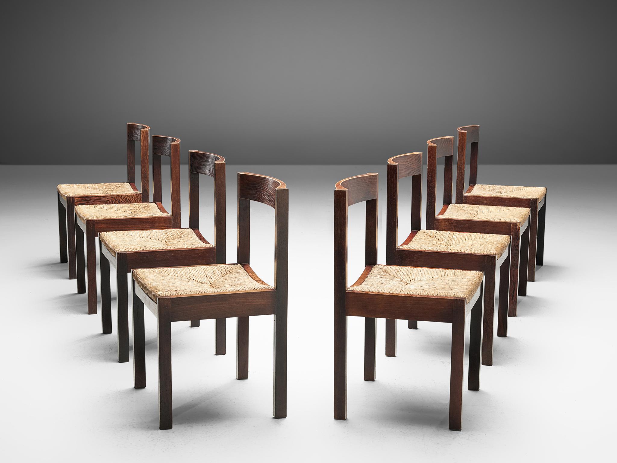 Martin Visser for 't Spectrum, set of 8 dining chairs, wengé and rattan, The Netherlands, 1960s.

A Dutch set of dining chairs that features a simplistic, modest design. The frame is made of wengé and features straight lines. Only the backrest is