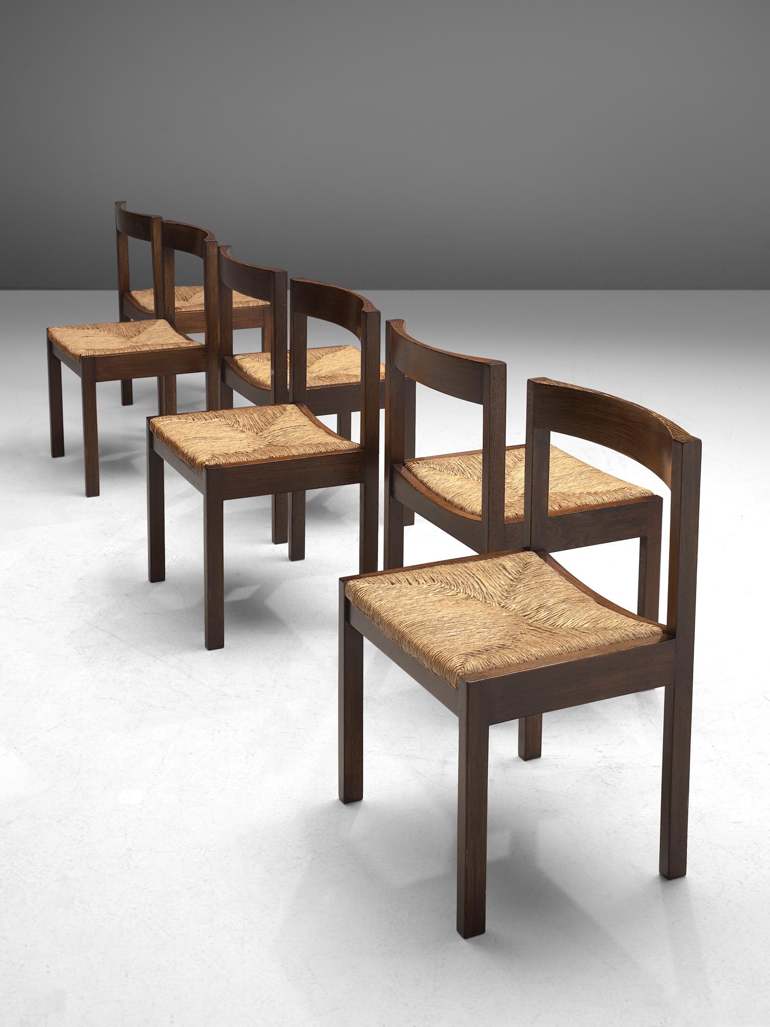 Set of 6 dining chairs, wengé, straw, The Netherlands, 1960s

Dutch set of dining chairs designed in the 1960s. The frame is made of wengé and features straight lines with the backrest slightly curved. The hand-crafted straw seat shows the beauty of