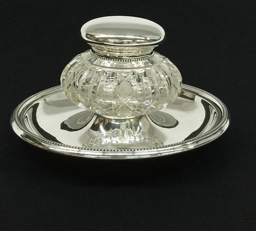 Dutch Silver and Crystal Cut Inkwell by J.M. Van Kempen and Son, 1874

The silver and crystal inkwell consists of  3 parts, all silver pieces are marked with the Dutch silver hall marks
The silver hall mark 
