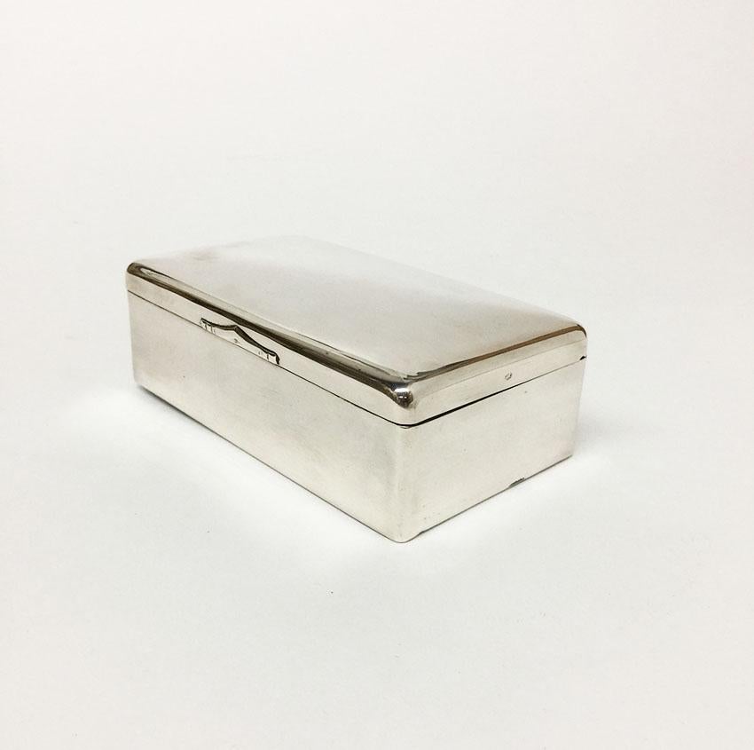 Dutch silver box by A. Presburg, 1951

Dutch silver box in model smooth silver. 
Made by A. Presburg, Haarlem 1932-1951
Silver box with interior of wood, which is used as box for pencils on the desk

With Dutch silver hall marks:
Walking Lion