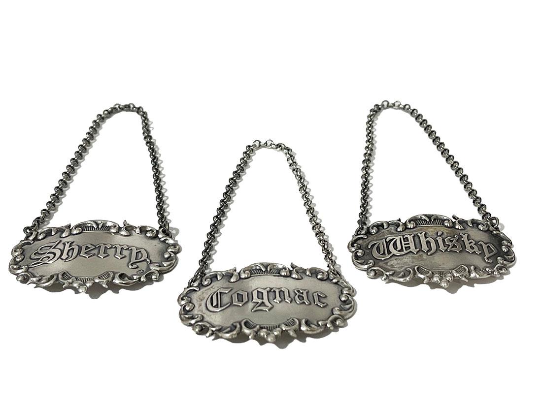Dutch silver decanter, bottle labels by Niekerk, Schoonhoven

Three silver Dutch labels for decanters or bottles with text Sherry, Cognac and Whiskey
All three Dutch silver hallmarked with the 