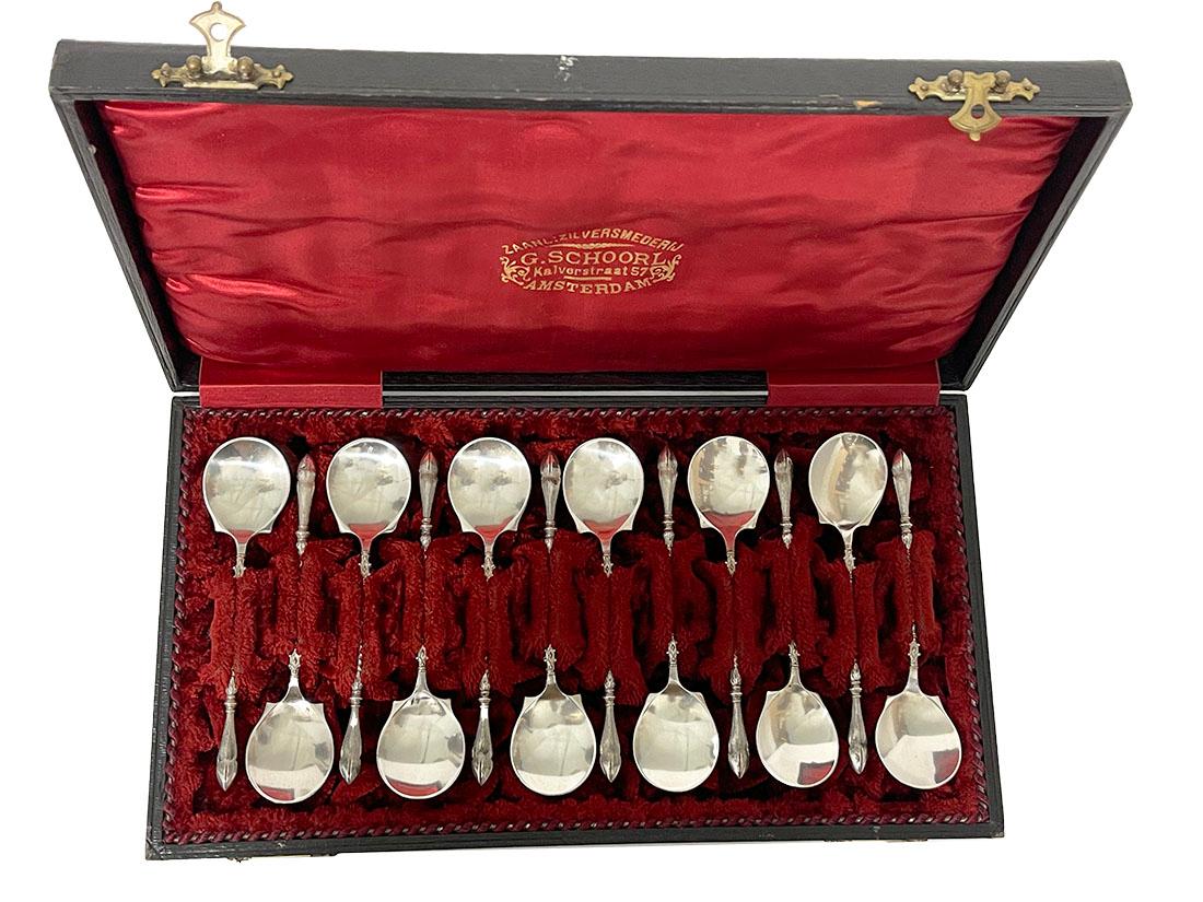Dutch silver ice cream spoons by Van Kempen & Zonen, ca. 1910

A set of twelve silver ice cream spoons with a partially twisted handle and a knucklebone at the end. All silver spoons bear the Dutch silver hallmark 