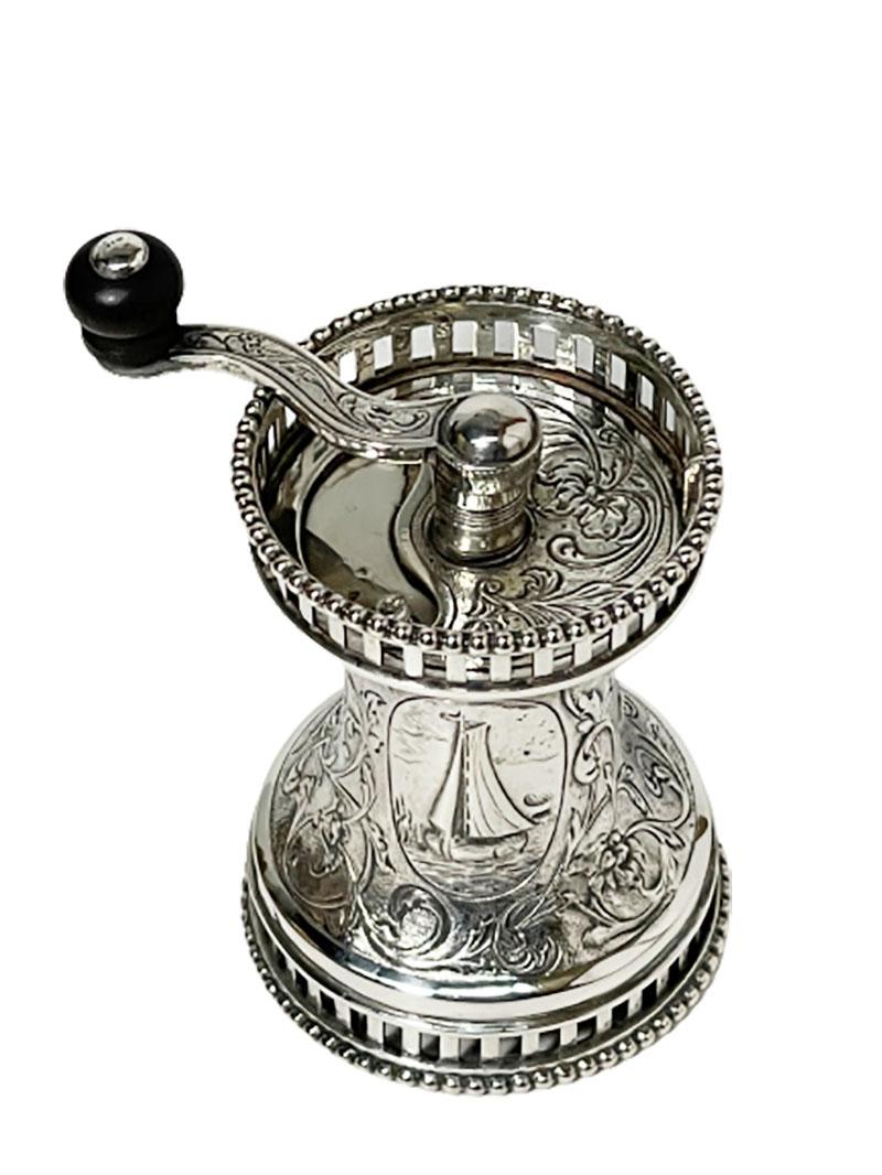 Dutch silver pepper mill by Vos & Co, Haarlem, 1915-1920

A silver pepper mill with scenes of Dutch landscape in medallion of a ship, a church and a wind mill. With pearl shaped edge and foliate scrolls.

Hall marks of the silver smith and the