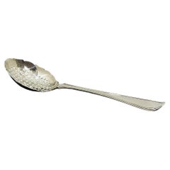Dutch silver serving spoon with openwork, 1883