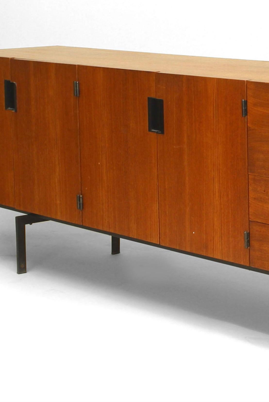 Dutch Post-War Design teak sideboard supported on black metal legs with 2 Pair of doors and 2 Pair of drawers (by CEES BRAAKMAN for UMS-Pastoe 
