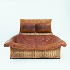 The Rock Tall back rattan loveseat sofa by Gerard van den Berg leather, 1970s