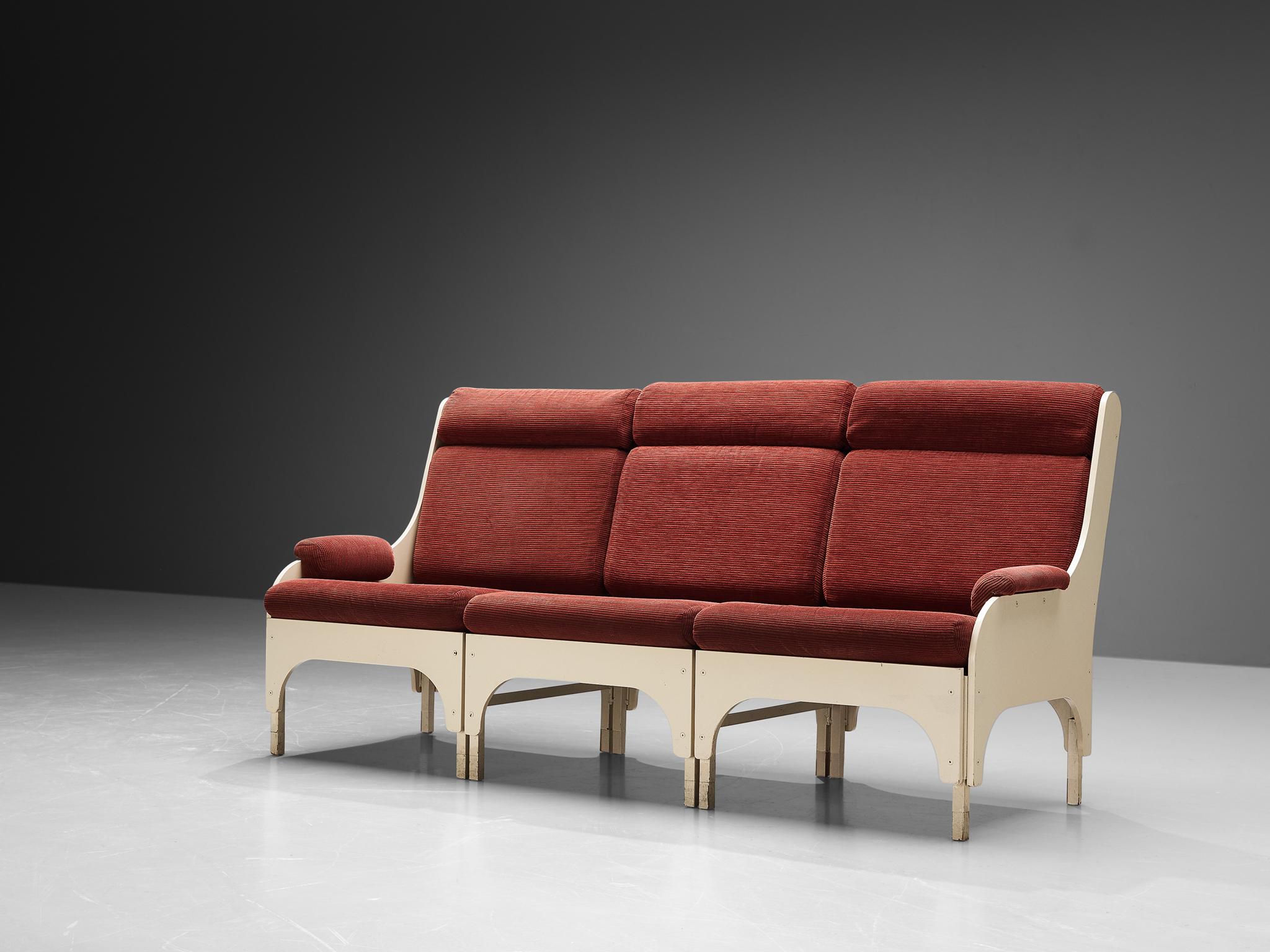 Three seat sofa, lacquered wood, fabric, The Netherlands, 1980s 

This sofa is characterized by a solid construction, featuring clear lines and striking curved shapes. Notice the architecturally built base that is composed of wide arches, which