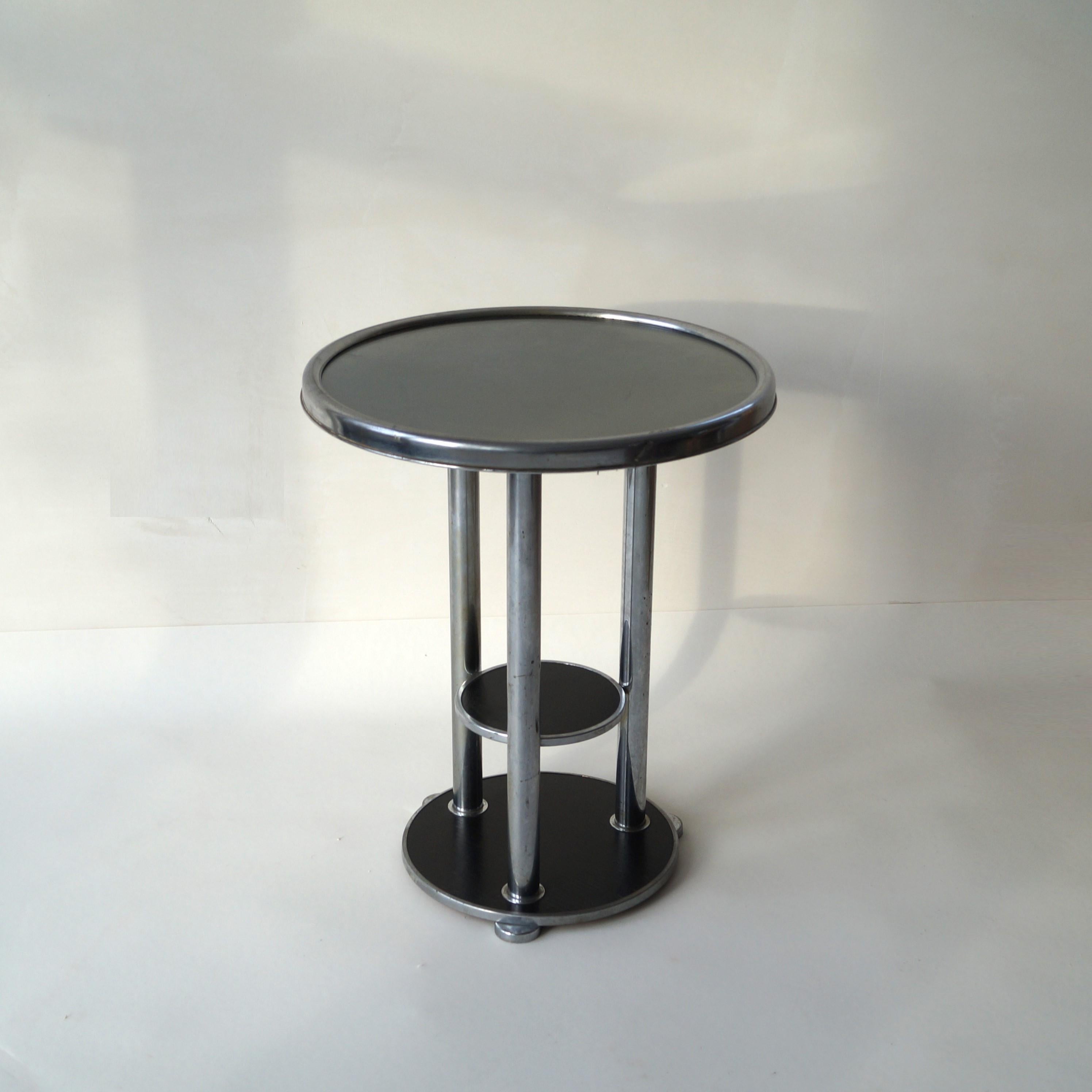 A rare design three tiered bauhaus table, Netherlands, 1930s. The unusual design gives it a very modernist appearance. The modest size makes it an ideal piece to use for a special accent in a room. Combines well with minimalist bauhaus furniture,