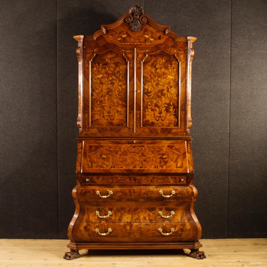 20th century Dutch trumeau. Exceptional quality furniture inlaid in walnut, burl walnut, rosewood, maple and fruitwood. Trumeau double body internally provided with numerous drawers and desk top also inlaid with floral decorations. Furniture