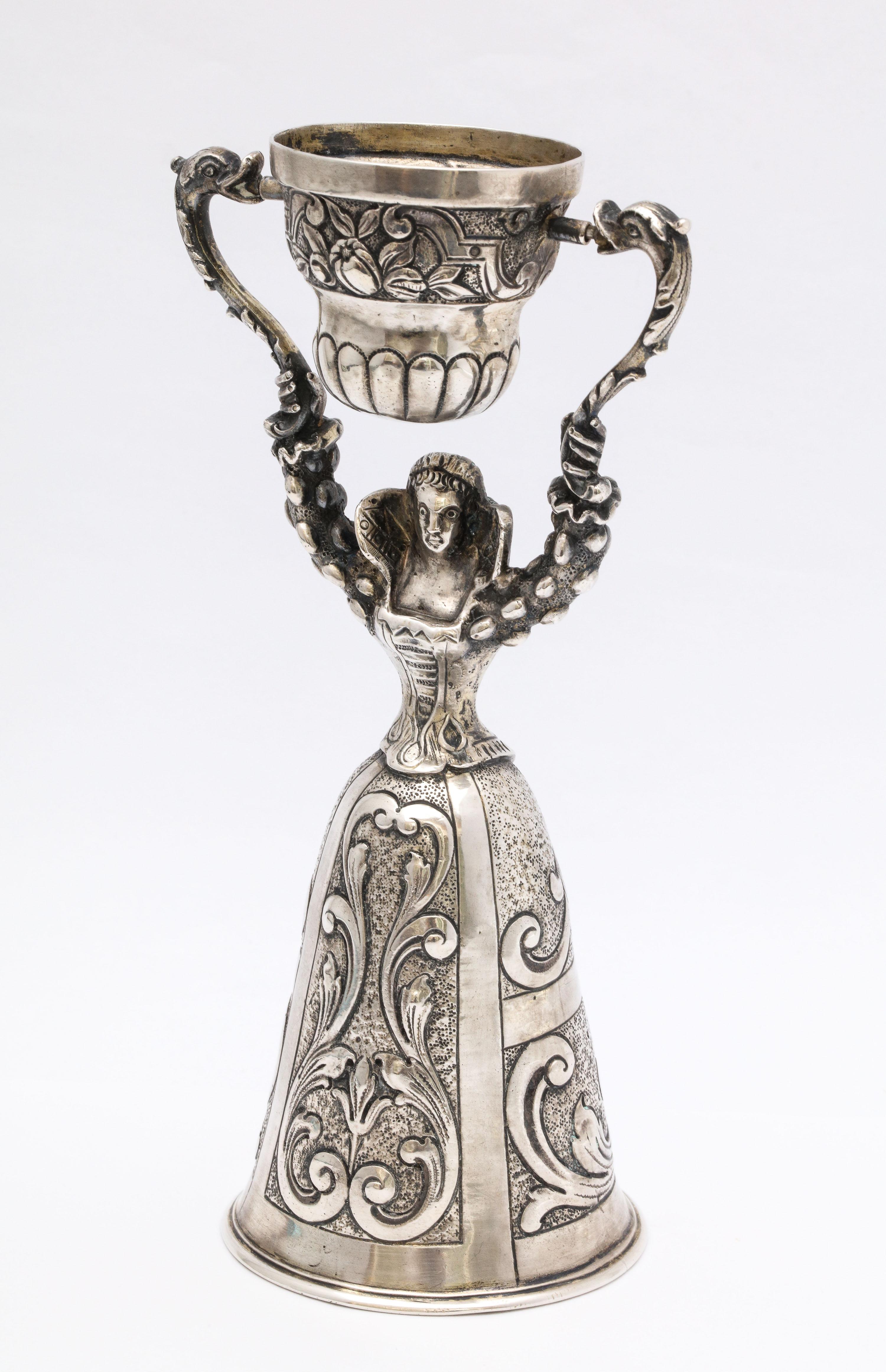 Dutch, Victorian period, Continental silver (.800) female-form wager/marriage cup, The Netherlands, year - hallmarked for 1847. Almost 6 1/2 inches high (at highest point) x 3 1/8 inches wide (arm to arm) x almost 2 1/2 inches diameter across
