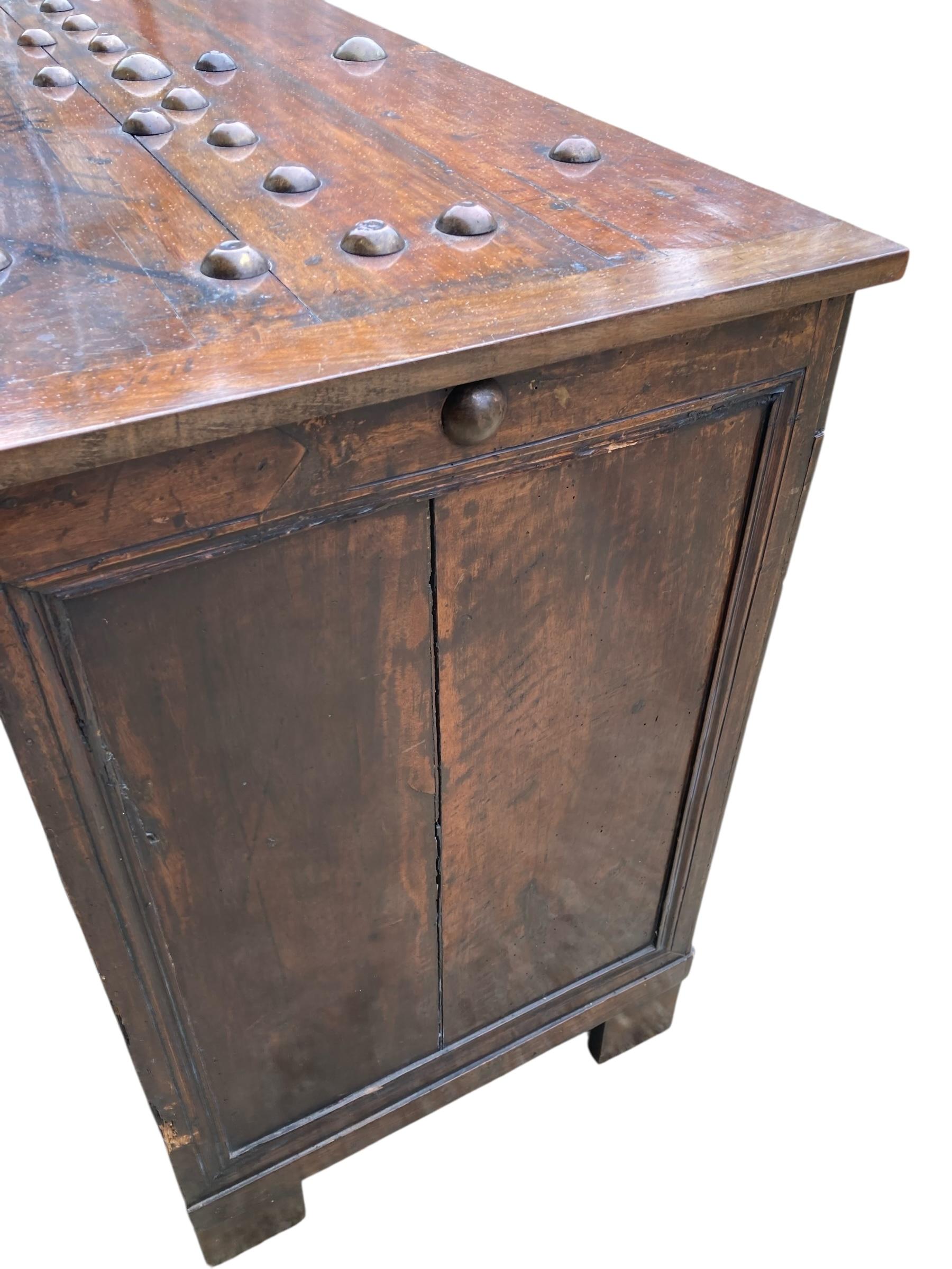 Dutch Walnut Commode Late 18TH Century with hinged Lidded top. Copper studded mounts with two panelled drawer the top being a false drawer for deep lidded storage on stile legs.

H: 86cm 

W: 123cm

D: 57cm