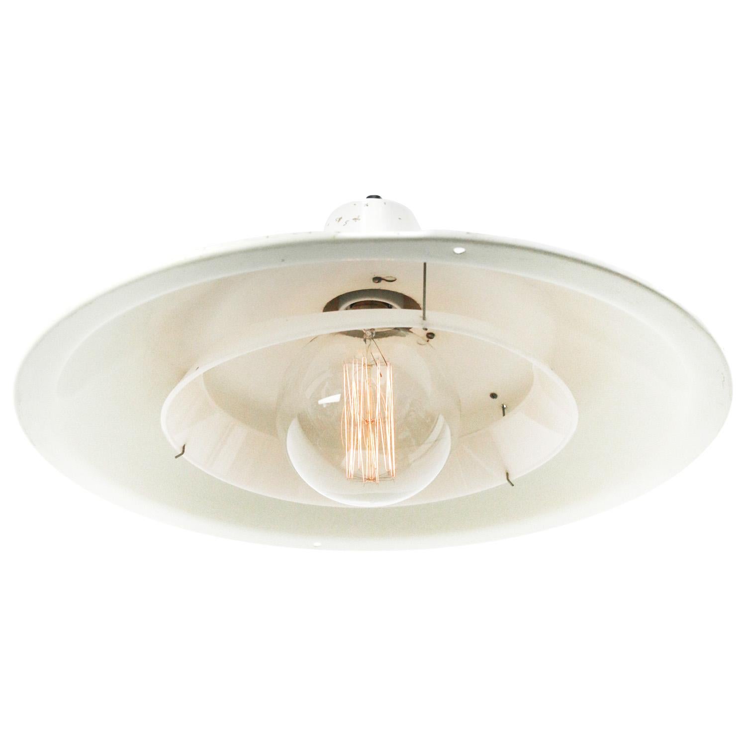 Dutch industrial factory pendant light by Philips, Louis Kalff
white metal, white interior. Transparent plastic ring

Weight: 1.40 kg / 3.1 lb

Priced per individual item. All lamps have been made suitable by international standards for