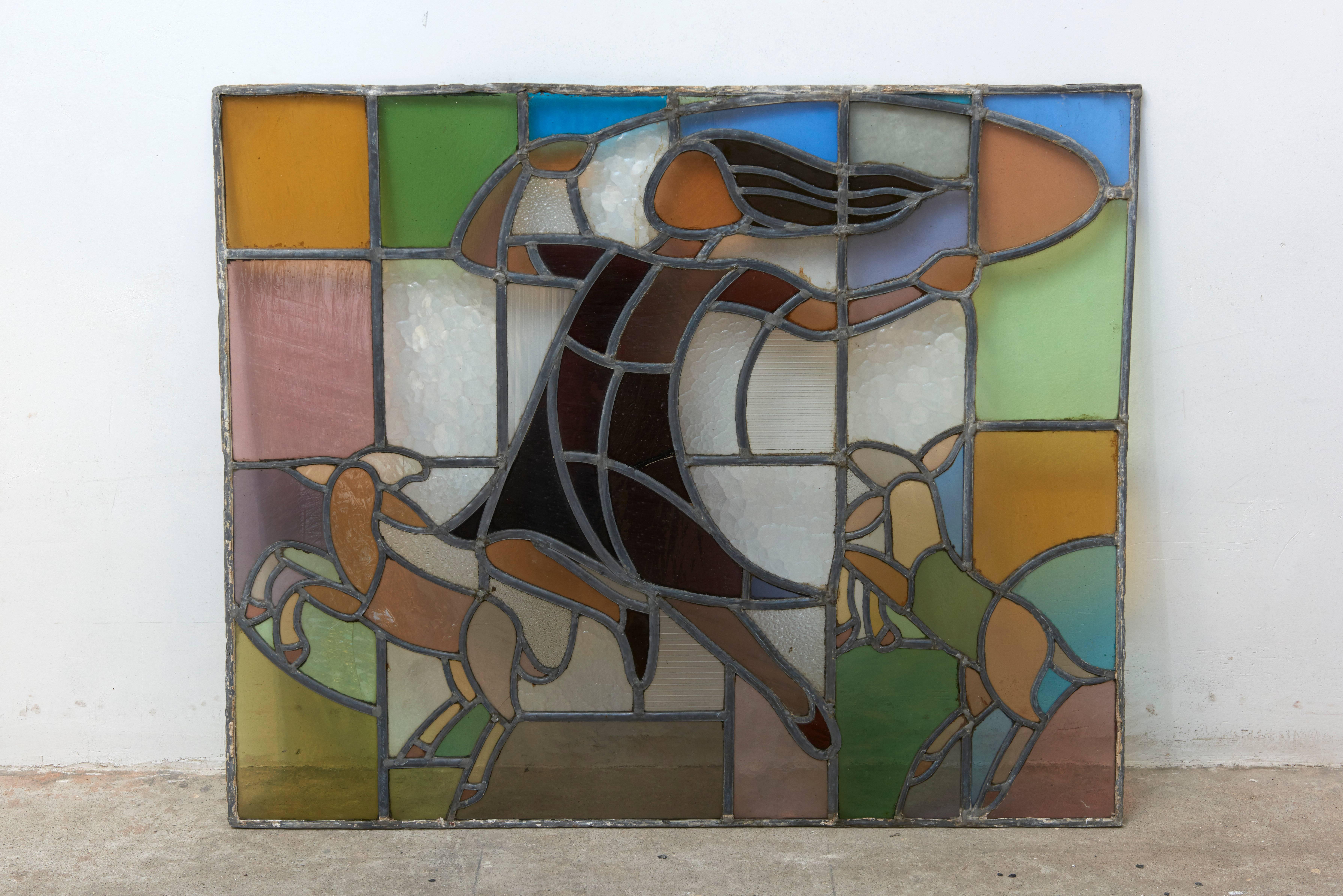 Stained-glass window in the series of children playing by the Dutch glass-artist Mengelberg
executed for the children's Sanatorium.
Beautiful combination of typical Art Deco clear and colored glass elements.
by playing movement of a child.
The