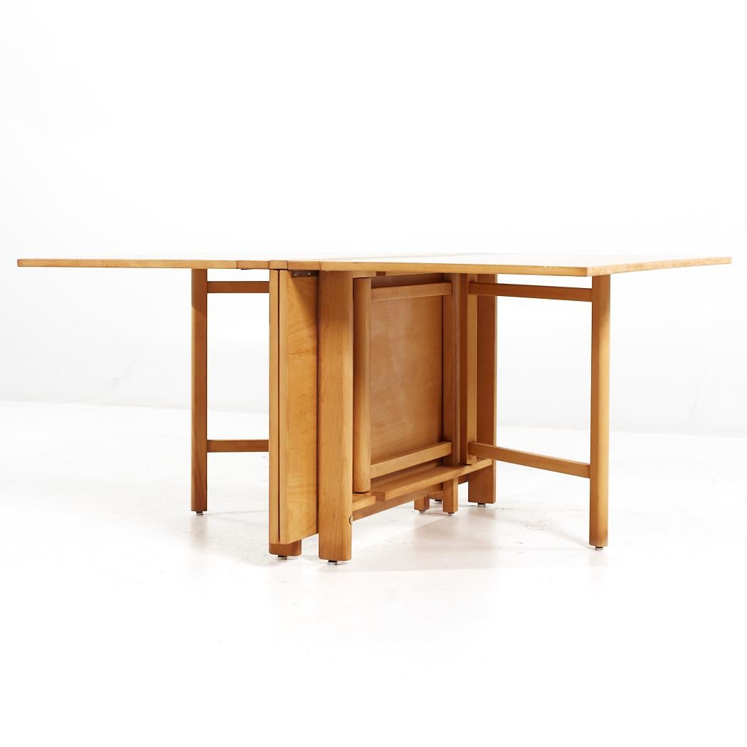 Mid-Century Modern Dux Mid Century Maria Swedish Elm Beech and Brass Expanding Dining Table For Sale