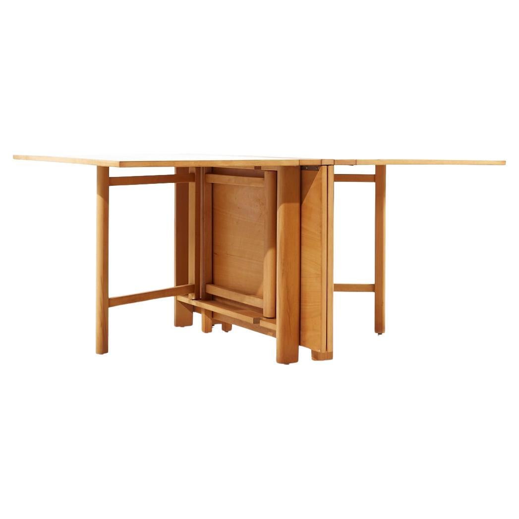 Dux, Maria, schwedischer, ausziehbarer Esstisch aus Ulmenholz und Messing, Mid-Century im Angebot