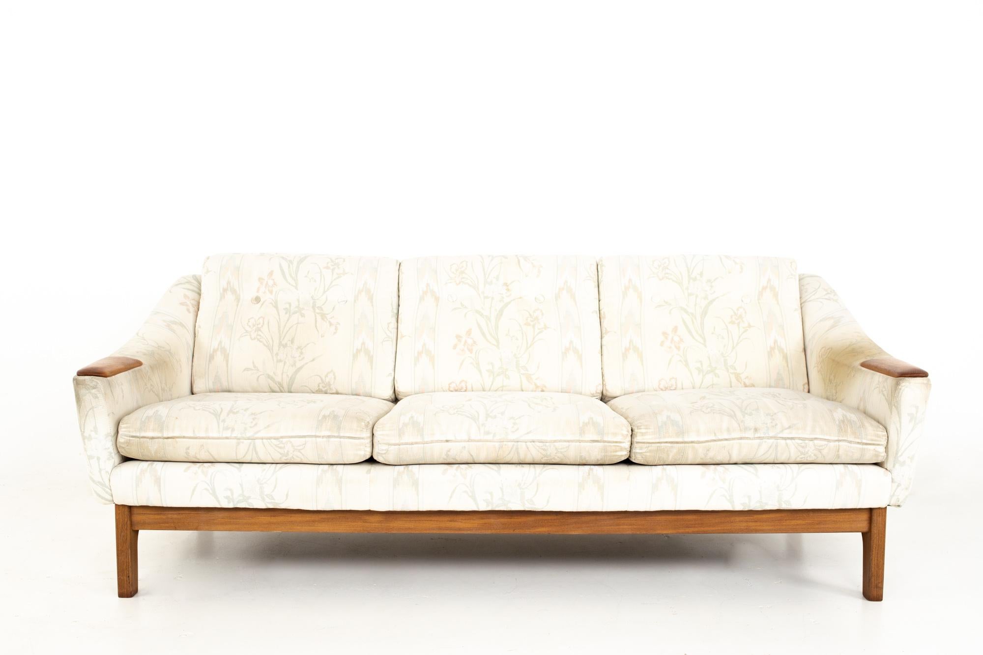 DUX mid-century teak upholstered sofa.

Sofa measures: 75.5 wide x 33 deep x 28.5 high, with a seat height of 17 inches 

All pieces of furniture can be had in what we call restored vintage condition. That means the piece is restored upon