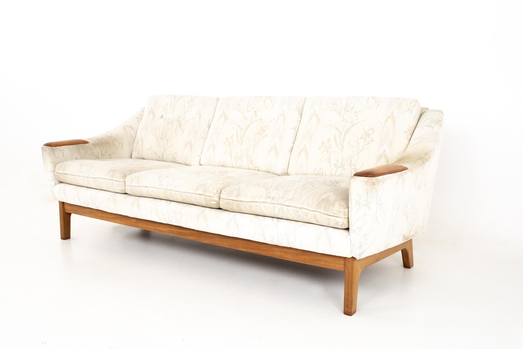 DUX Mid Century teak upholstered sofa
Sofa measures: 75.5 wide x 33 deep x 28.5 high, with a seat height of 17 inches

All pieces of furniture can be had in what we call restored vintage condition. That means the piece is restored upon purchase so
