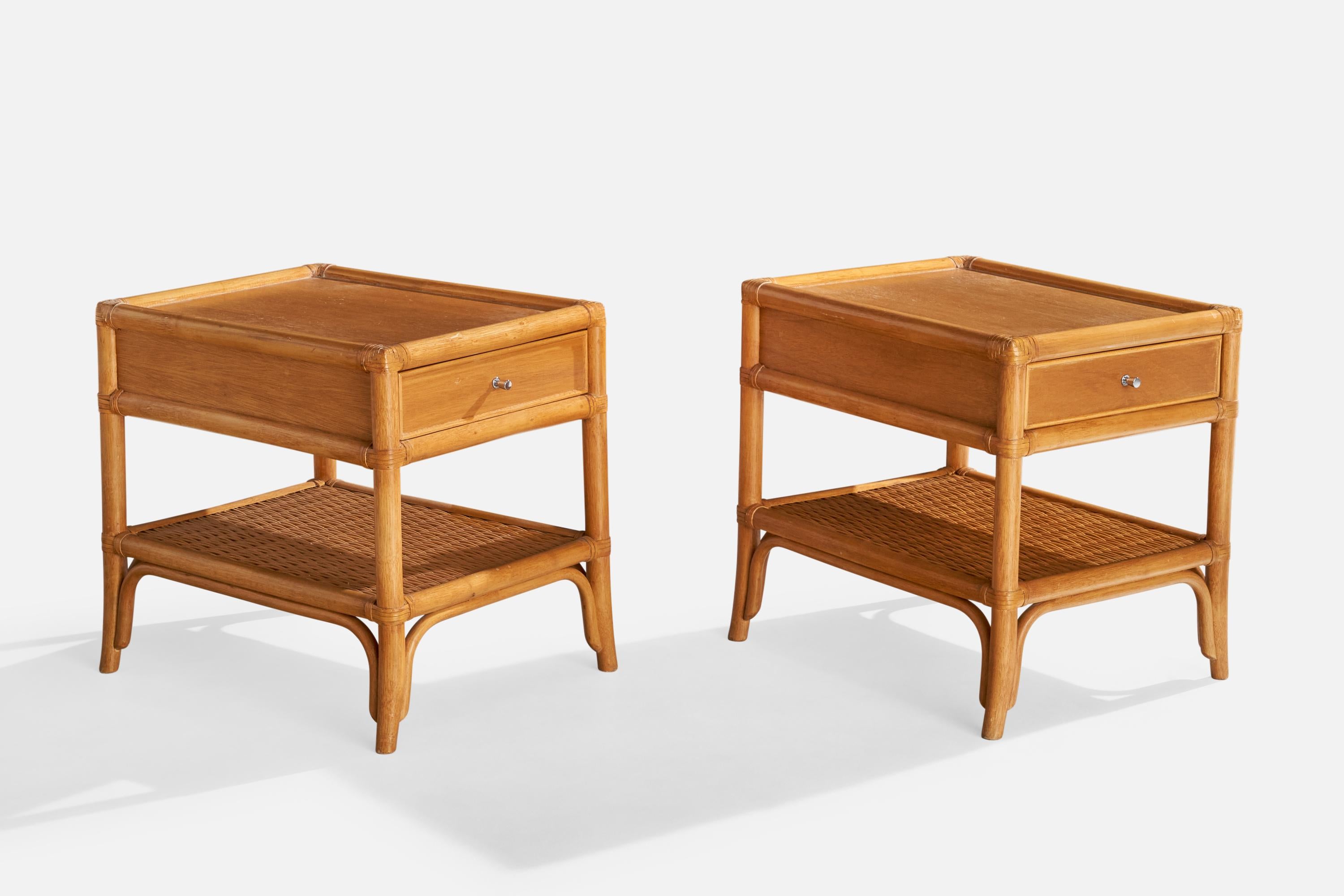 A pair of bamboo, oak, rattan and metal nightstands produced by Dux, Sweden, c. 1960s.

Dimensions: 21.25” H x 17.625” W x 23” D