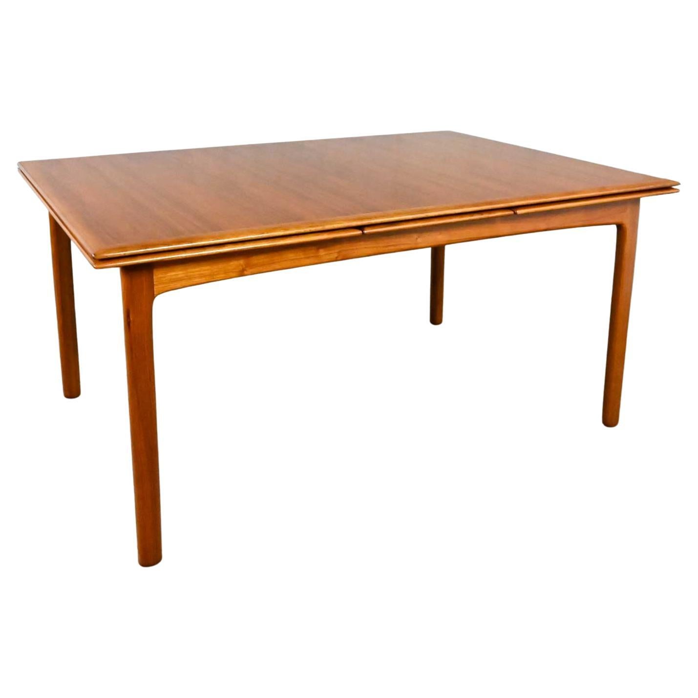 DUX Scandinavian Modern Teak Draw Leaf Extending Dining Table by Folke Ohlsson
