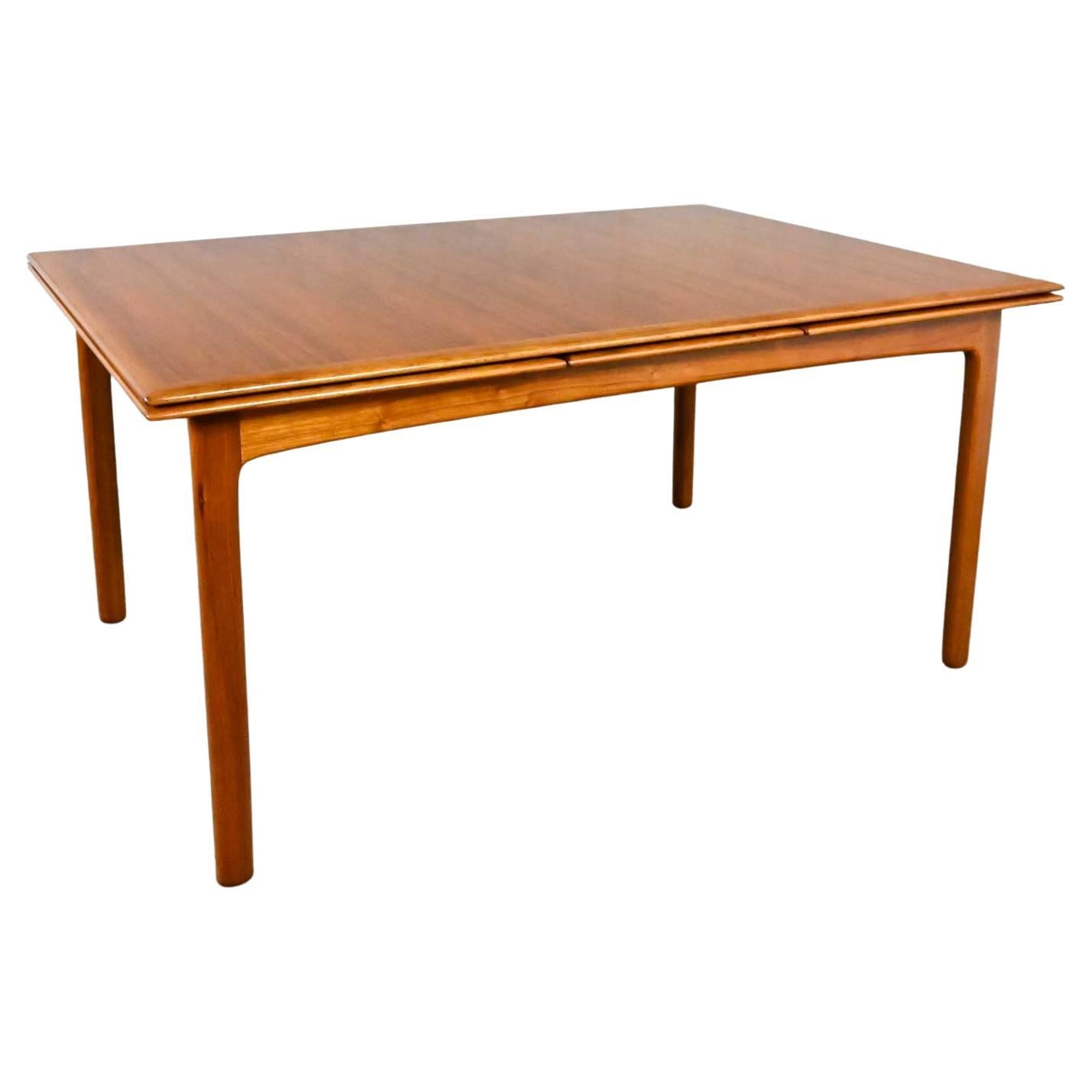 DUX Scandinavian Modern Teak Draw Leaf Extending Dining Table by Folke Ohlsson 