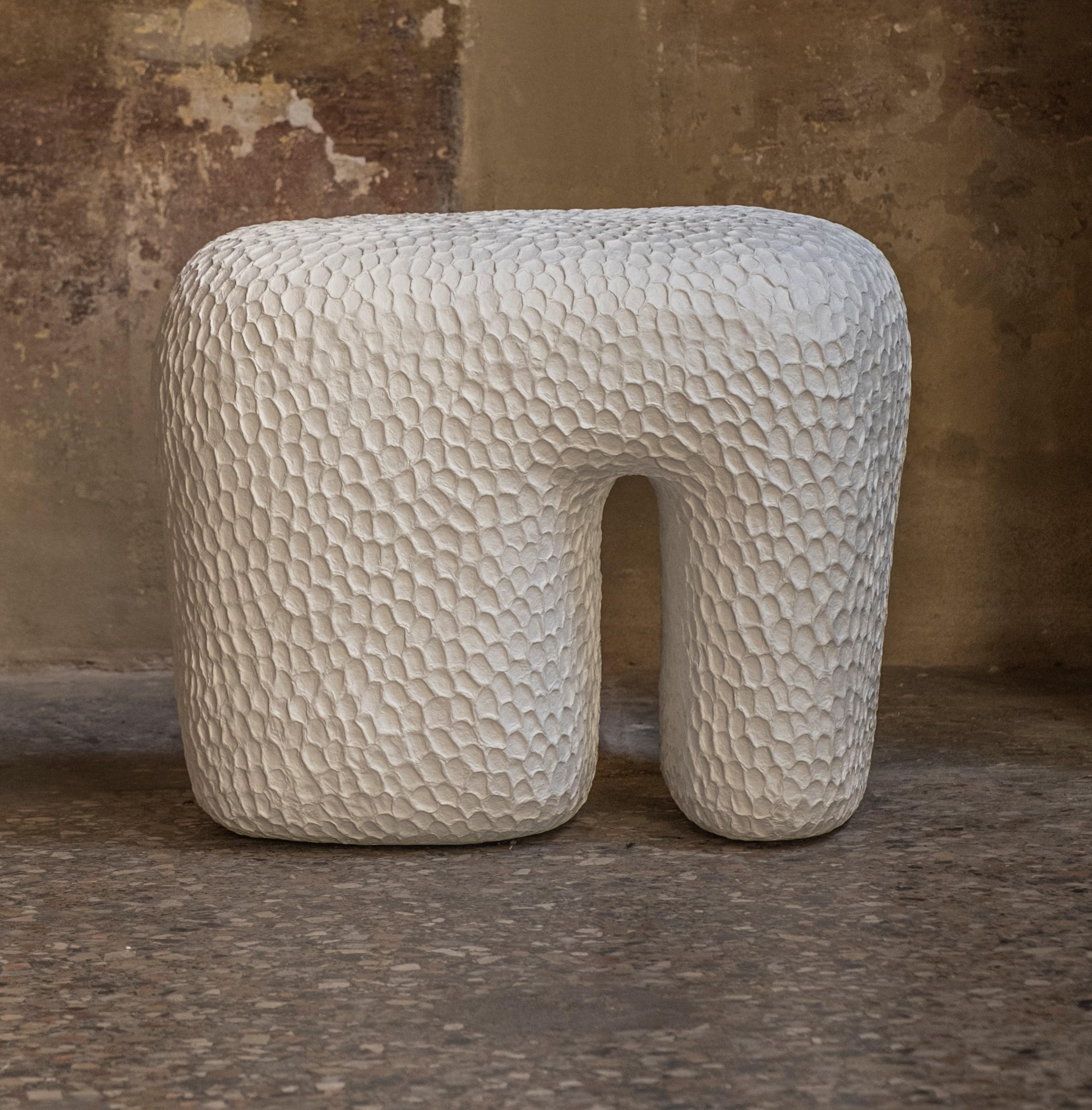 Duzhyi stool by Faina
Design: Victoriya Yakusha.
Material: Hand-sculpted in the author's signature sustainable material Ztista - a blend of paper,
clay, hay, and other live elements conceived to one day return to nature. Wooden