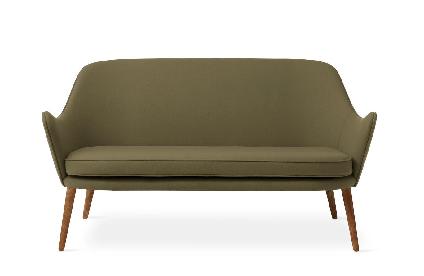 Dwell 2 seater Olive by Warm Nordic
Dimensions: D137 x W66 x H 73 cm
Material: Textile upholstery, Solid smoked or white oiled oak legs, Wooden frame, foam, spring system.
Weight: 35 kg
Also available in different colours and finishes. 

Warm
