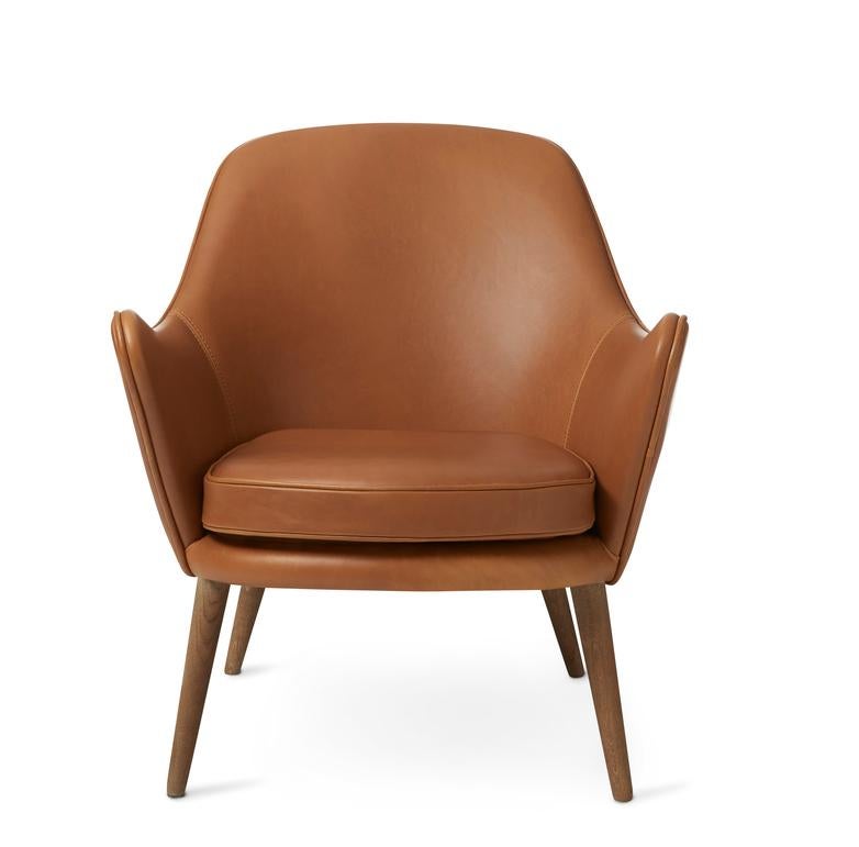 Dwell lounge chair silk camel by Warm Nordic.
Dimensions: D69 x W66 x H 73 cm.
Material: textile or leather upholstery, solid smoked or white oiled oak legs, wooden frame, foam, spring system
Weight: 19 kg.
Also available in different colours