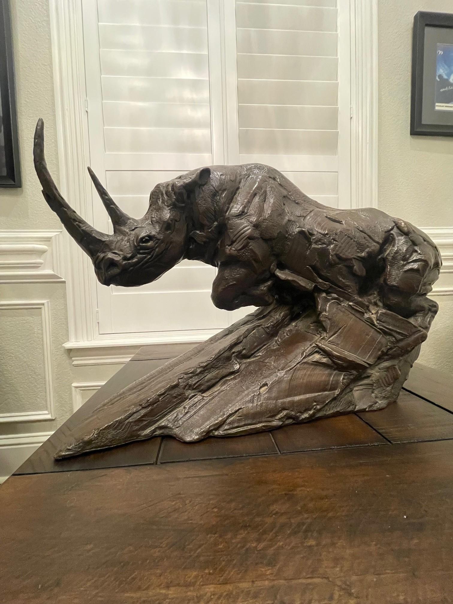 Dylan Lewis Bronze Charging Black Rhino, Maquette
S136 Charging Black Rhinoceros Maquette Numbered 4/15

DYLAN LEWIS (B. 1964)
Bronze
‘Dylan Lewis, ‘SCS Foundry’ stamp
The edition of number 4, of a series of 15
Signed and Numbered 4/15

This piece