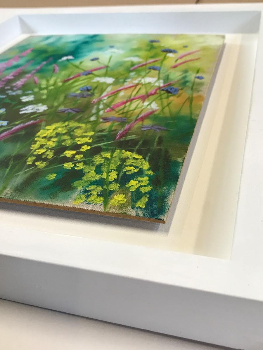 Garden Study II 2022 is an original macro style realist painting by Dylan Lloyd, presenting a close up view of a wild garden in bloom. With beautiful blue purple and white flowers dotted around the foreground and a hazy blue background.

ADDITIONAL