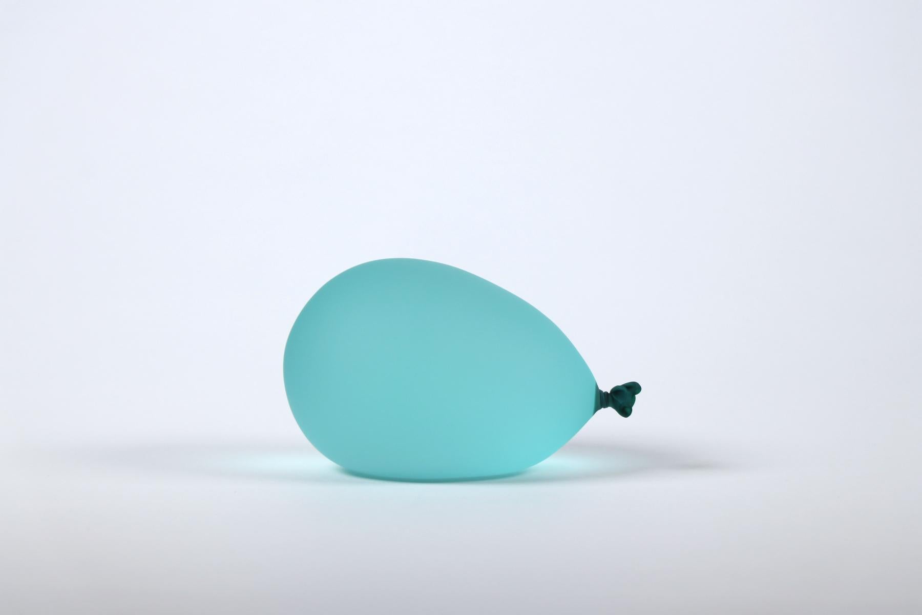 A hyper-realistic glass sculptor, Dylan's playful creations deceive the eye with their lifelike appearance. Whether mimicking water balloons or plastic bags filled with water housing a goldfish cracker, each piece is meticulously designed and