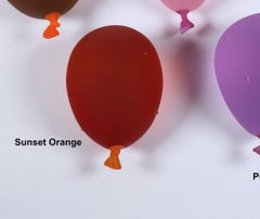 Dylan Martinez - Orangefarbener Wasserballon im Sonnenuntergang mit Tropfen, Skulptur 2025