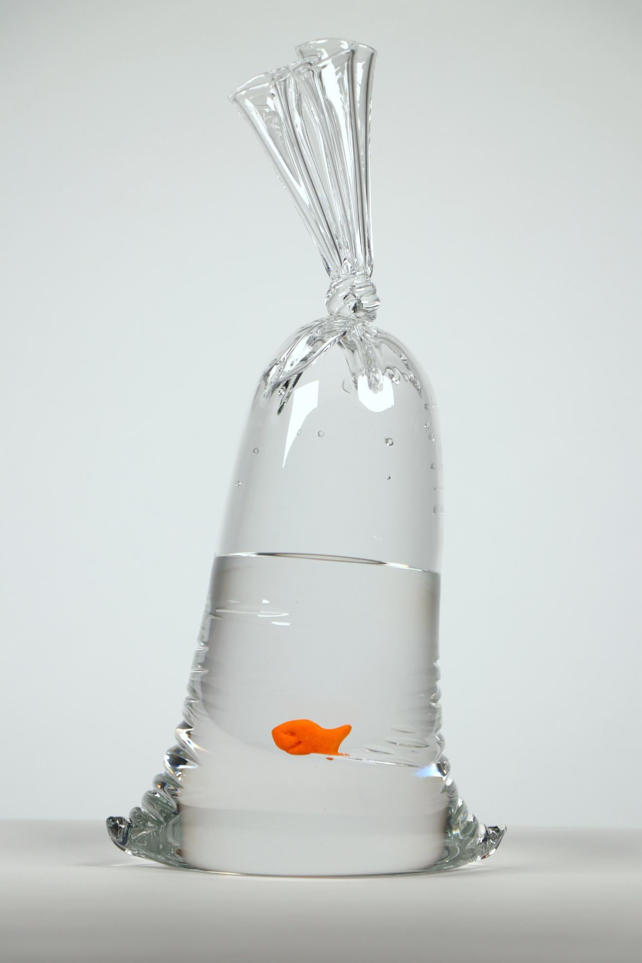 Inspired by popular demand, these limited-edition hyperreal goldfish cracker glass water bags are a playful nod to the carnival goldfish in plastic bags. 

Created with molten glass at over 2000° F, each piece is hand sculpted, signed, and comes