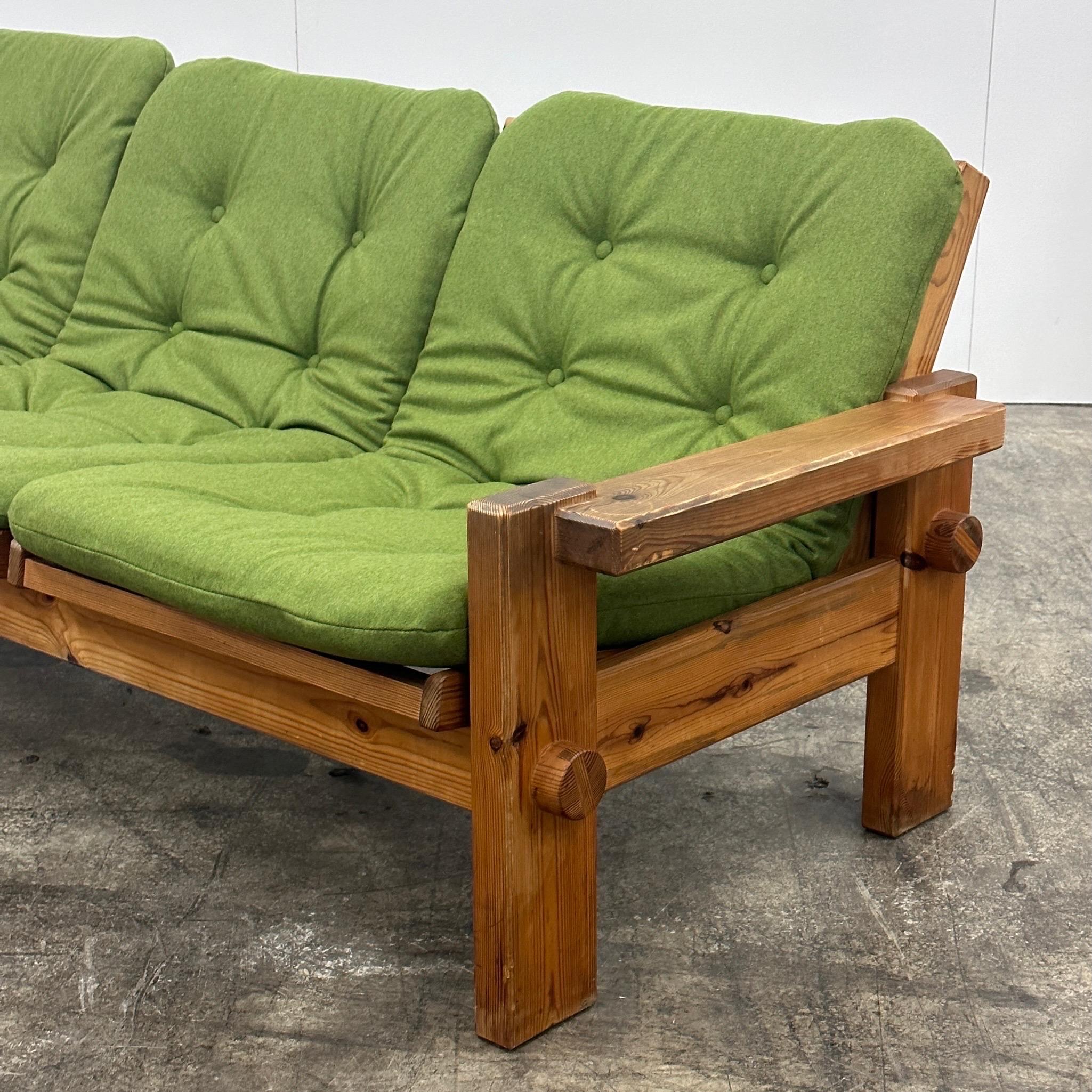 c. 1970s. Constructed of full pine throughout. Upholstered in green kiwi wool fabric. Made in Sweden by Swedese. We have a full set available, contact us if you’re looking for more. 