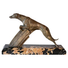 Dynamic Bronze Greyhound Sculpture with Vintage Patina on a Portor Marble Base