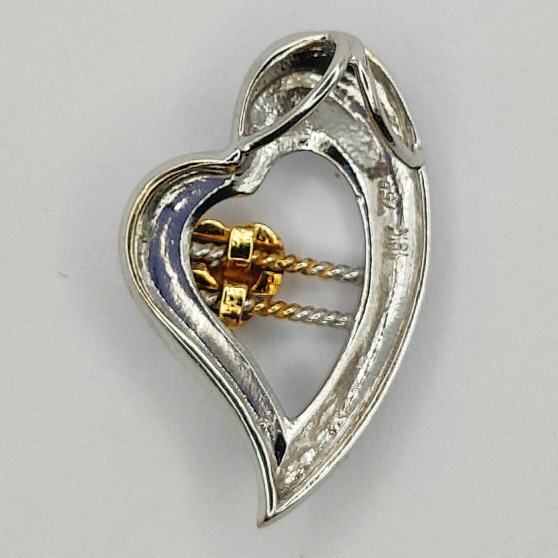 Brilliant Cut Dynamic Heart Diamond Pendant in 18K White and Yellow Gold For Sale