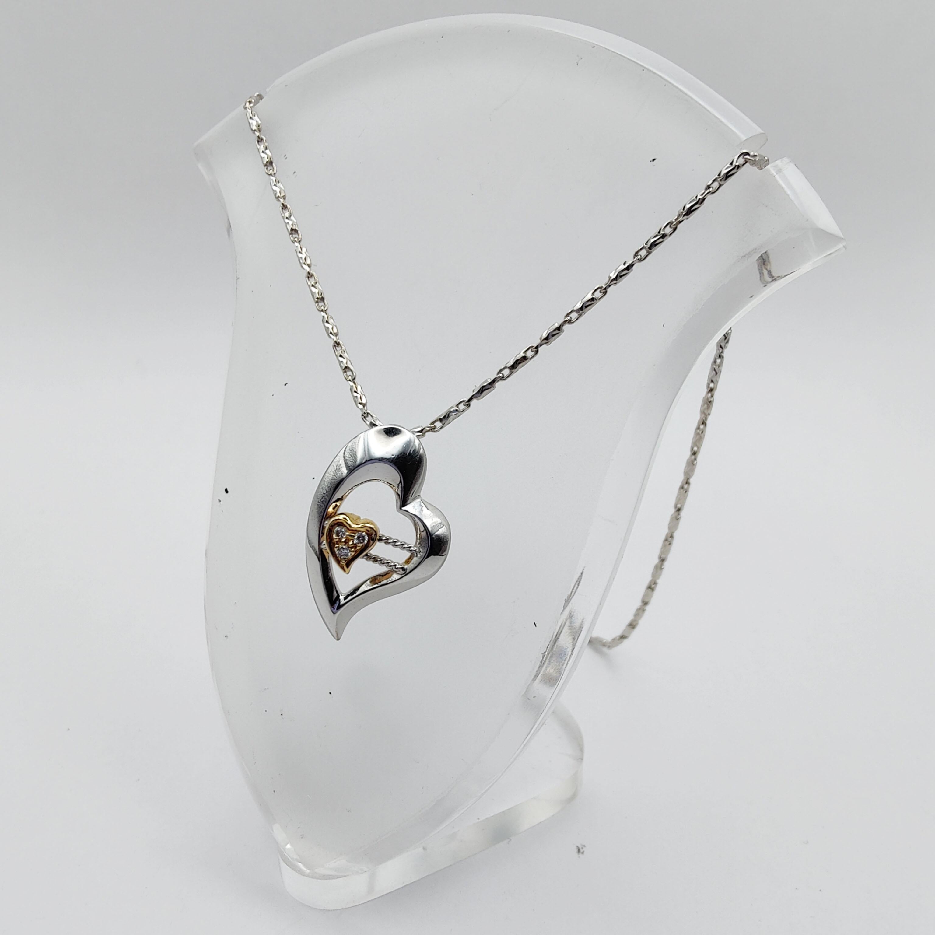 Pendentif Dynamic Heart en or blanc et jaune 18 carats avec diamants en vente 2