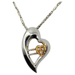 Dynamic Heart Diamond Pendant in 18K White and Yellow Gold