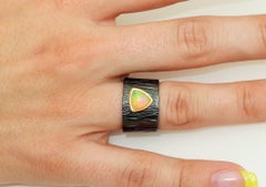 Dynamic Solitaire Ethiopian Opal Band Ring