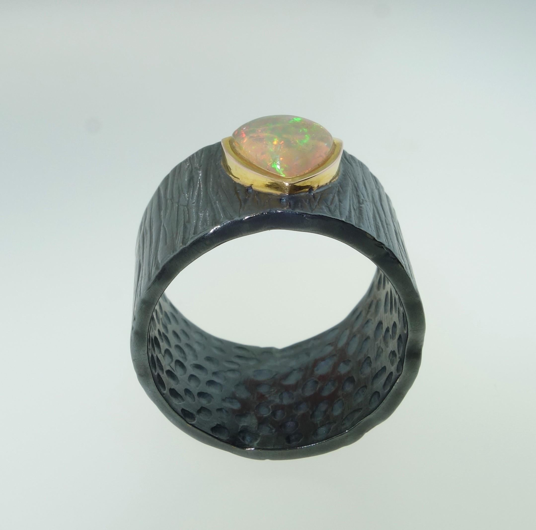 Contemporary Dynamic Solitaire Ethiopian Opal Band Ring For Sale