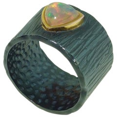 Dynamic Solitaire Ethiopian Opal Band Ring
