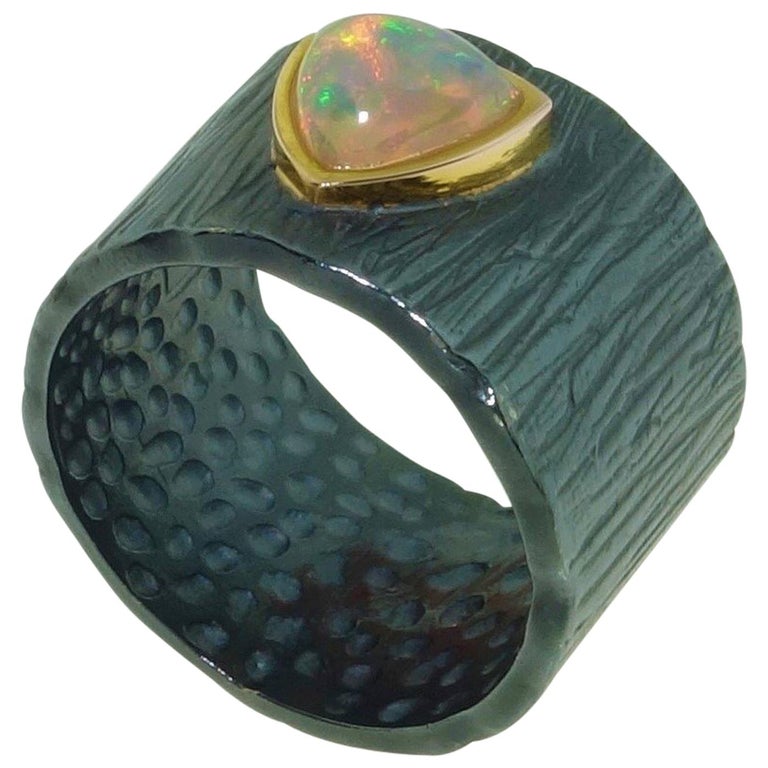 Dynamic Solitaire Ethiopian Opal Band Ring For Sale at 1stDibs