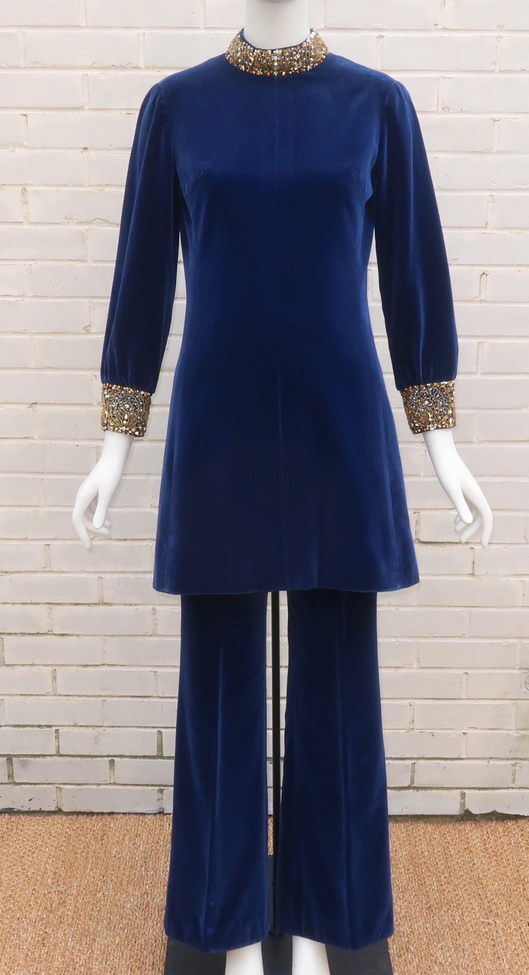 Yeah baby!  Get a swinging 1960's vibe in a Dynasty blue velvet pant suit with heavily beaded collar and button cuffs.  The two piece ensemble consists of a tunic style top that can serve double duty as a mini and pants with a subtle bell cuff. 