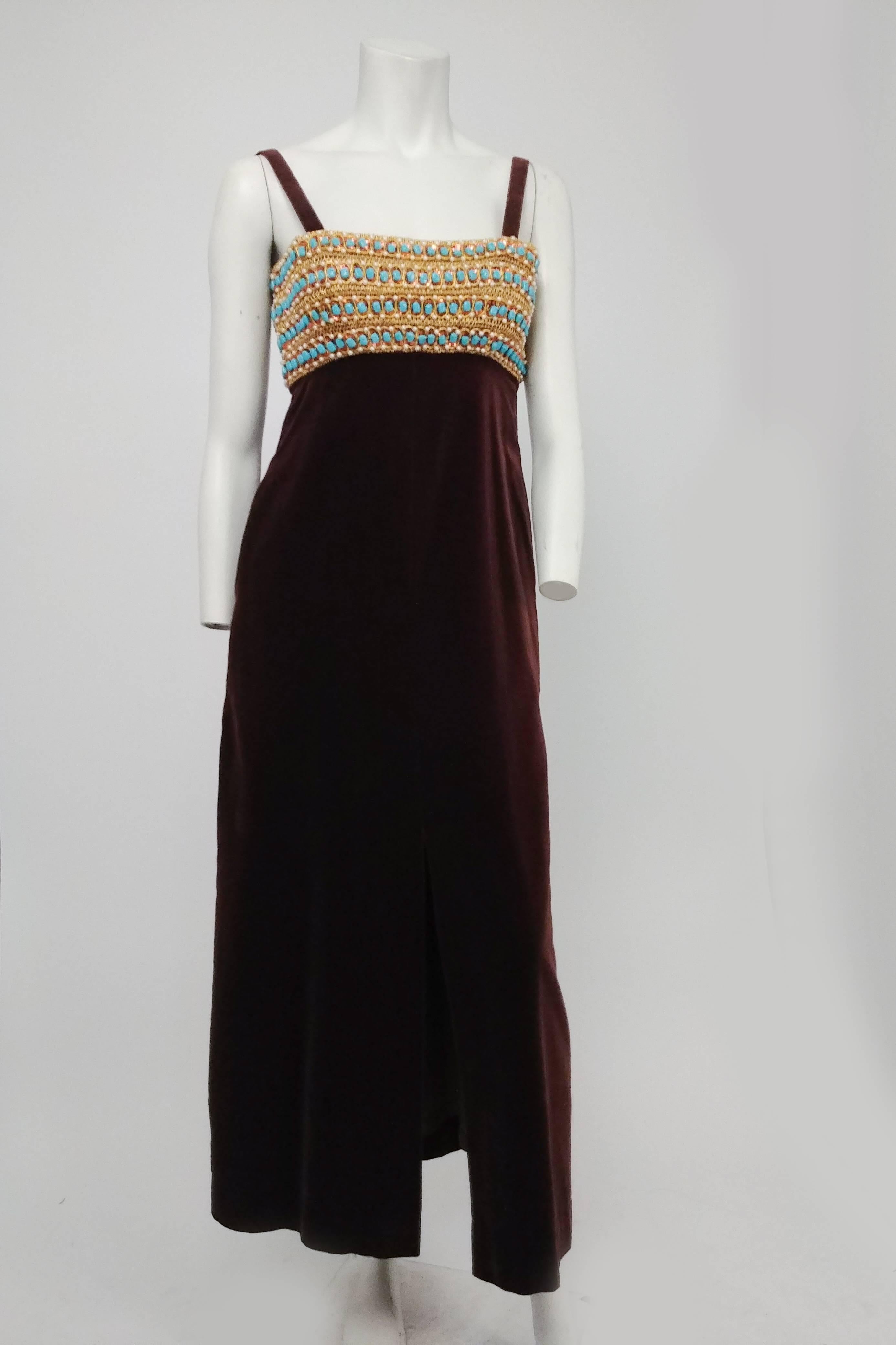 Brown Velvet Beaded Maxi Dress & Bolero, 1960s. Empire waist maxi-length dress completely beaded at bodice. Slit up front seam for ease of movement. Long-sleeve matching bolero with matching beaded trim. 