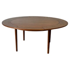 Dyrlund Lotus Round Teak Dining Table with Flip-Out Extension Leaves MCM