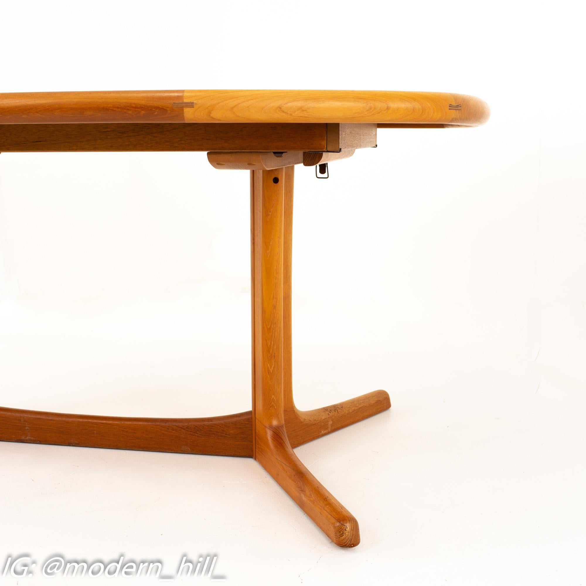 Dyrlund Mid Century hidden leaf teak dining table

Table measures: 64 wide x 42 deep x 29 high

Comes with two leafs that are each 20 inches 

This price includes getting this piece in what we call restored vintage condition. That means the piece is