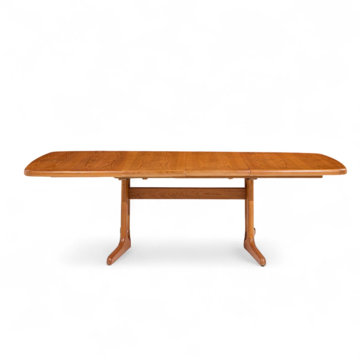 Dyrlund Style Mid Century Danish Teak Hidden Leaf Expanding Dining Table with 2 Leaves

This table measures: 65 wide x 39.25 deep x 28.75 inches high, with a chair clearance of 26.75 inches, each leaf measures 19.75 inches wide, making a maximum