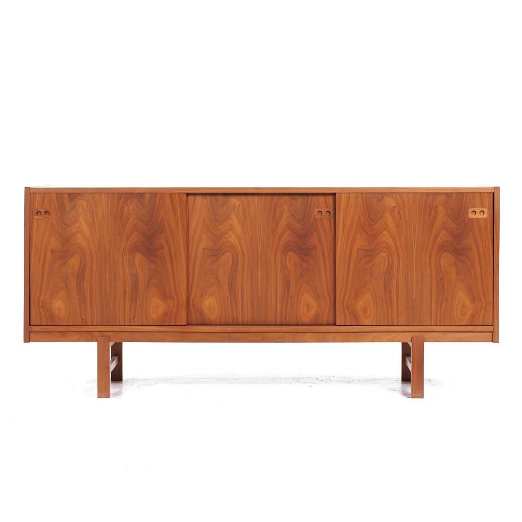Dyrlund Style Mid Century Danish Teak Credenza

This credenza measures: 67 wide x 16.5 deep x 30 inches high

All pieces of furniture can be had in what we call restored vintage condition. That means the piece is restored upon purchase so it’s free