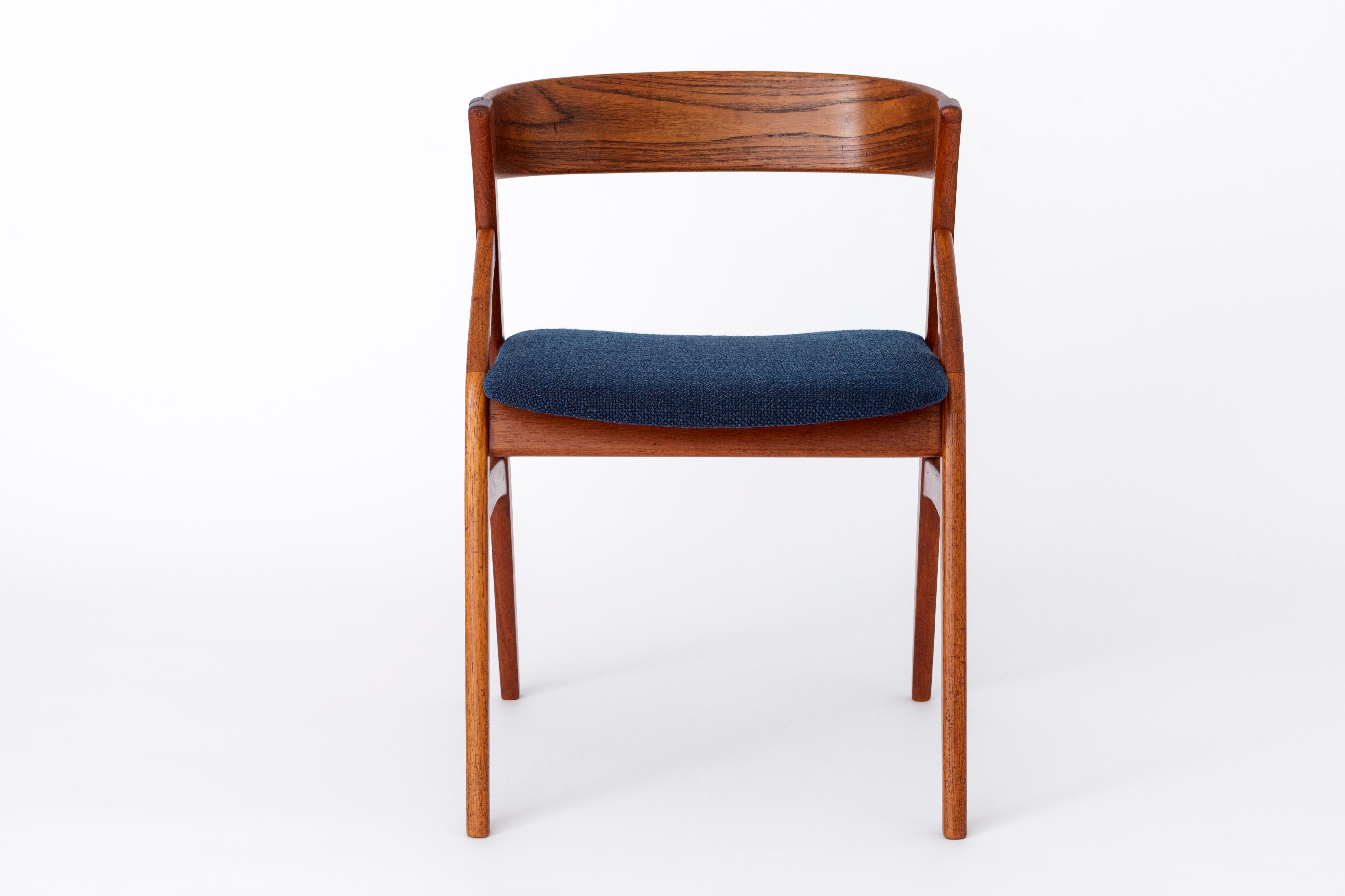 Vintage chair by manufacturer Dyrlund, Denmark. 
Production period: 1960s. 

Chair frame was repaired in the back area. See photos. 
The chair frame is sturdy and the chair can be used without restrictions. 
Seat reupholstered with dark blue fabric. 